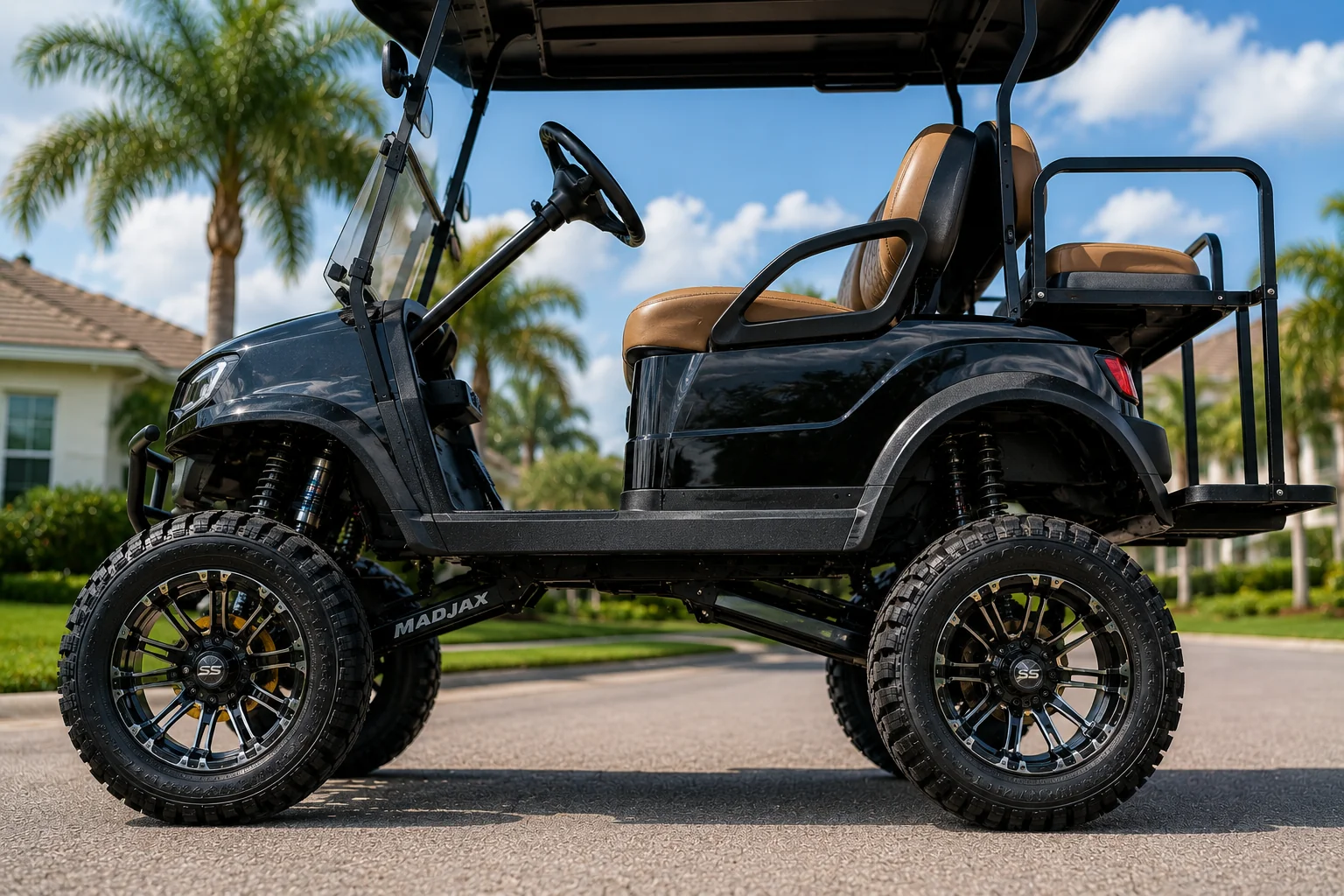 Custom black golf cart with bronze seats and lifted suspension in The Villages driveway.